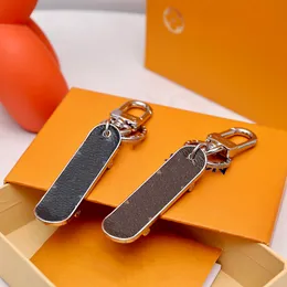 Designer unisex DICE Odłączane klęsce kluczy Aolly Metal Ręcznie robiony moda Key Key Mężczyźni Mężczyźni Kobiety Wciągu Wzór samochodowy biżuteria na brelok