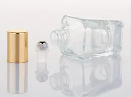 15ml透明なガラスエッセンシャルオイルローラーボトルアロマセラピー香水リップボムロールボトルのロール金銀帽子を飲みます