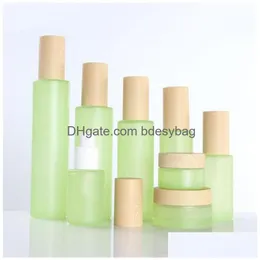 Bottiglie di imballaggio 20 ml 30 ml 40 ml 60 ml 80 ml 100 ml 120 ml Green glassata in vetro flaccello a lozione a spruzzo di lozione a spruzzo con coperchi in legno CA DH2HC