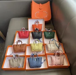 Designer-Ohrhörer, Schlüsselschnalle, Tasche, Auto, süßer Schlüsselanhänger, handgefertigt, weiches Leder, Lippenstift, Mini-Schlüsselanhänger, Damen-Geldbörse, Taschen, Anhänger, Münzen, Geldbörse, Geschenk