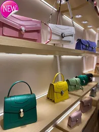 Kvinnors designer väskor Ny P: s armhoppningsläder shopping tote triumfbåge messenger guangzhou baiyun läder stad fabrik direktförsäljning