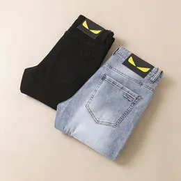 Tasarımcı erkek kot skinny jeans moda klasik klasik ince küçük ayaklar boş zaman üst düzey düz elastik eşleşen pantolon