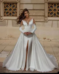 Abiti da sposa a maniche lunghe con perle retrò Abiti da sposa a sirena trasparenti con gioiello Abiti da sposa su misura con spacco staccabile Vestido de novia