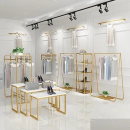 Мебель для спальни золотая одежда магазин одежды на дисплее