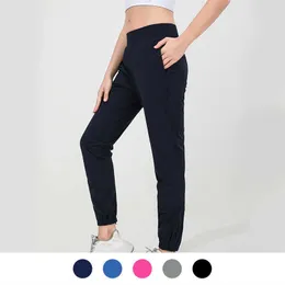 LU-88245 Pantaloni da yoga Leggings da donna Autunno e inverno Pantaloni ad asciugatura rapida Tasca per gamba Cerniera Pantaloni sportivi rilassati Abbigliamento da palestra