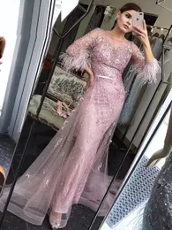 Sexy Arabic Evening Dresses Wear Pink Jewel Neck Illusion Lace Appliques Crystal Beads Feather Long Sleeves Mermaid Overskirts Prom Gowns