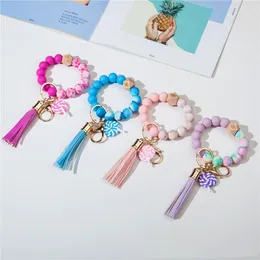 Keychains coloridos lollipop beads de silicona brazalete pulsador de llavero muñequera de cuero anillo de llave para mujeres regalos de joyería