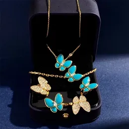 Bröllopsmycken set märker klassiska Europa kända för kvinnor blå turkos fjäril örhängen halsband armband ringar 221115