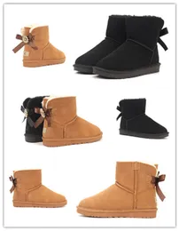 Diseñador de marca de moda uggitys Botas de nieve de lujo Australia ugglie bow Diseño Botas medianas de cuero Zapatos cálidos de invierno Wggs Botas de lana