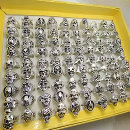 كامل الكثافة 100pcs الأنماط Top Mix Skull Rings الهيكل العظمي للمجوهرات الهدايا للرجال الحزب لصالح رجال راكب الدراجة النارية Man Jewelry Brand New236O