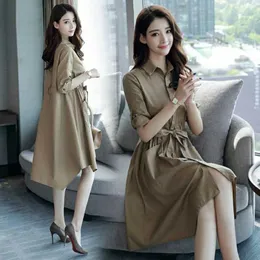 Damskie okopy płaszcza moda koreańska wersja koreańska spódnica paska wiatrówka stojak a-line retro solidny kolor elegancka sukienka o długości kolan