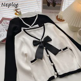 Kvinnors stickor Tees Neploe V-Neck Bowknot Decoration Sweet Woman Sweaters Autumn Korean Style Short Sticked Cardigans Pearl Button Knit Topps 221123