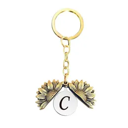 Nyckelringar Retro Guld Engelska bokstav Solros Locket Key Ring Ancient Initial Keychain Holders Bag Hang For Women Men Fashion Jewelr Dhuks