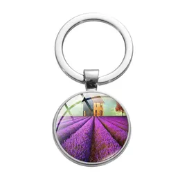 Nyckelringar Lavendelblomma Glas Cabochon Nyckelringar Metal Picture Keychain Handväska hänger för kvinnor Barn mode smycken droppe Deliv Dhmtg