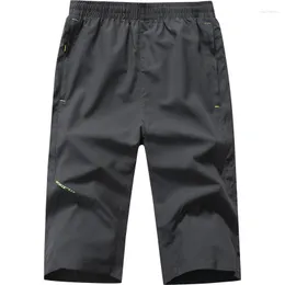 Pantalones cortos para hombres Hombres casuales Fitness al aire libre Pantalones cortos Dry Aprendible Atentable Tamaño suelto 5xl