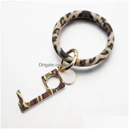 Tecla anéis PU Bracelete de couro Teclado Pulseira Teclor de chaveiro keyrings keyrings de punho de keyring com o abridor de porta acrílica Drop Drop Je dhjyq