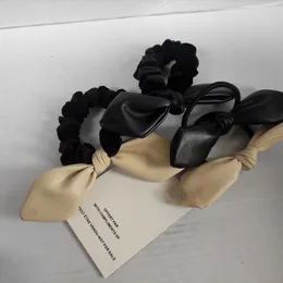 Mode C-Symbol klassische elastische Fliege Haargummis Haarseil markiert Haarband Papierbandkarte