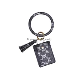 Anéis -chave Mulheres meninas cobra pulseira de couro PU Pulseira -chave Teclorizando keyring keyring keyrings de pulseira com carteira Pu dhmi6