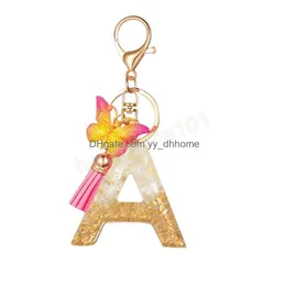 열쇠 고리 패션 영어 편지 키 체인 Tassel Butterfly AZ Keyring Glitter 스팽글 충전 수지 키 체인 선물 액세서리 DHX8Q