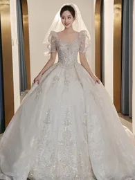 2023 Bohemisk bollklänning Bröllopsklänningar Korta ärmar Spetsar Appliciques A Line Beach Brudklänningar svep Train Boho Aviti da Sposa Wedding Dress