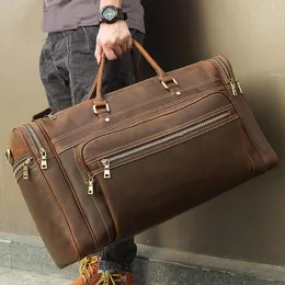 ダッフェルバッグ高品質の本革の大きな旅行バッグ17インチラップトップ手荷物荷物男性牛革耐久性のある大きな広々