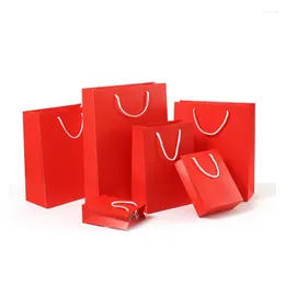 Embrulhado de presente kraft paper saco de papel vermelho cor azul branco boutique de peso boutique para roupas de roupas de casamento material de natal 2022