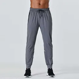 pantolon Sonbahar uzun erkekler lulus spor koşu hizalama yoga açık spor cepler slim fit eşofman altı lu pantolon koşucu pantolonu erkek rahat elastik Boş zaman trendi 2023