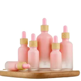 Imballaggio Vuoto Gradiente Bottiglia di vetro rosa Collare in legno falso Flaconi per pipetta in gomma superiore rosa Contenitore riutilizzabile Confezione 5ml 10ml 15ml 20ml 30ml 50ml 100ml