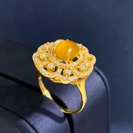 Nuovo arriva Anello femminile stile palazzo retrò fiore cavo ovale calcedonio naturale pietra principale apertura anello alimentare