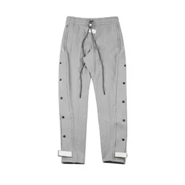 Nowe męskie spodnie High Street Hip Hop Pants But Button Spanty Spiress Casual Sports Spodni Streetwear