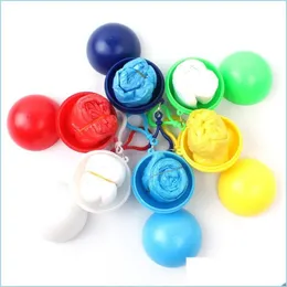 Raincoats Disposable Raincoat Plastic Ball Key Chain Raincoats Portable Spherical Case Traveling Hiking Cam Drop Delivery 2022 Home Dhsco