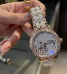 Moda donna geometrica fiore di cristallo rosa orologi numero calendario orologio da polso al quarzo acciaio inossidabile cinturino in ceramica bianca orologio femminile 34 mm impermeabile