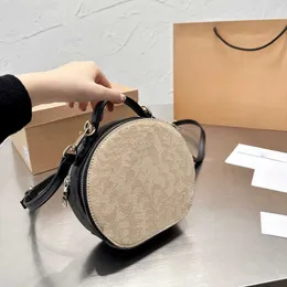 Mk top round bag