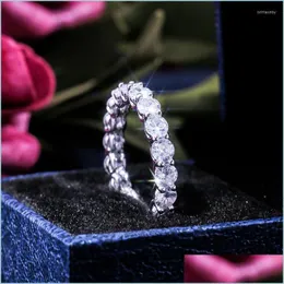 Bröllopsringar Bröllopsringar Hyperbole Round Finger Ring Band med FL Circle Zircon Stone Dazzling Women Jewelry Luxury Proposal Pres DHWWR