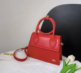 Modedesigner kvinnors nya bärbara messenger axelväska vit pu läder handväskor handväskor kvinnor