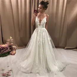 Nova coleção Boho Vestidos de noiva Sexy Sparas de espaguete sexy Vestidos de noiva brilho com apliques de renda backless vestidos