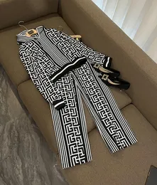 Tweedelige damesbroek zwart-wit designer runway-pakset High-profile damespak bedrukt sweatshirt met capuchon wijde pijpen broekset BS115