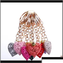 Keychains Lanyards Aessories20Pcs/Lot Wholesale Hollow Heart Fashion Charm Cute Purse Bag Pendant Car Keyring Chain Ornaments Gift Otrt6