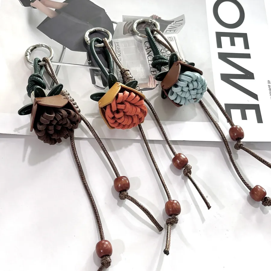 Leather flower keychain vs fabric: Which lasts longer looks