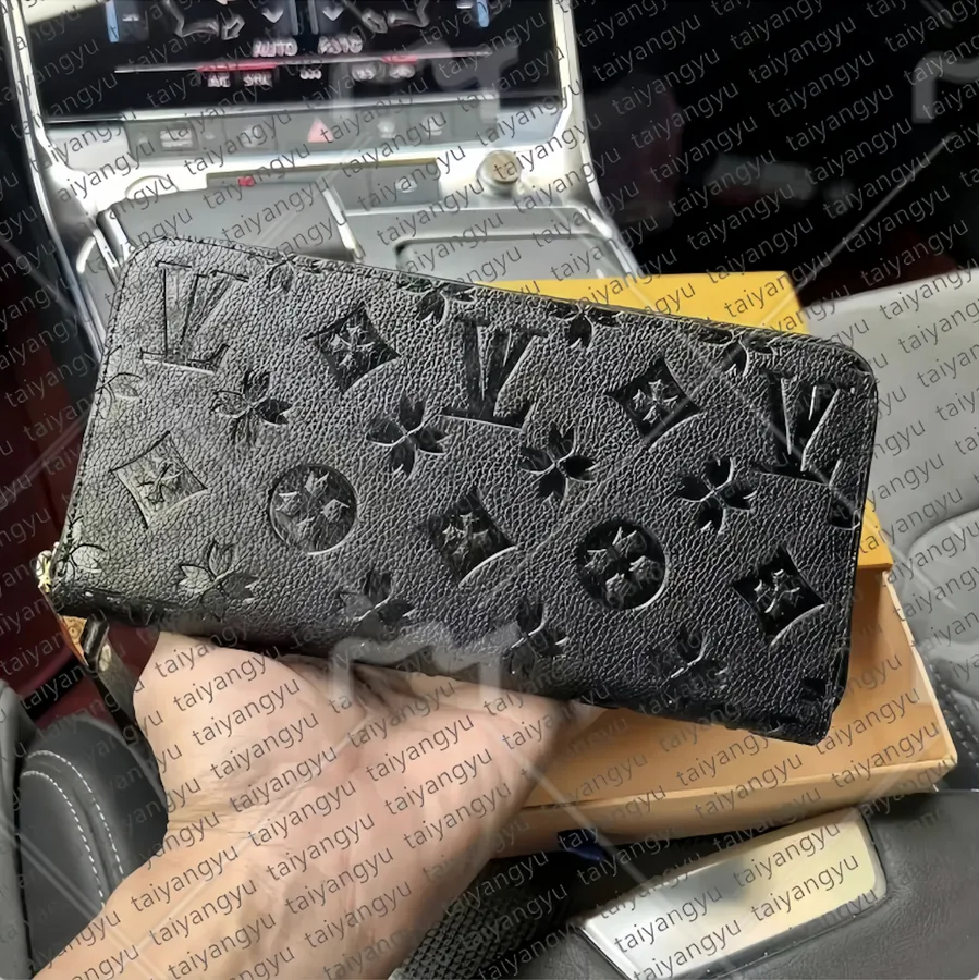 Long zipper wallet vs checkbook wallet: Are checkbooks even