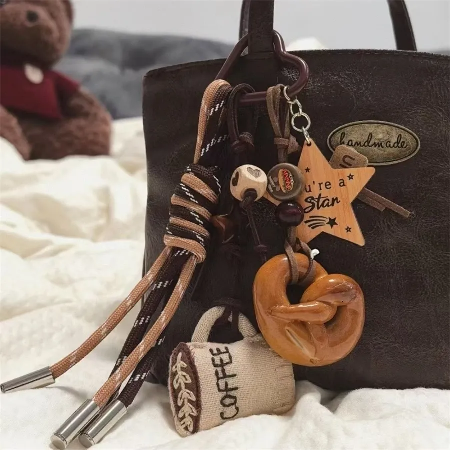 Bread bag pendants vs designer bag charms: are quirky keychains