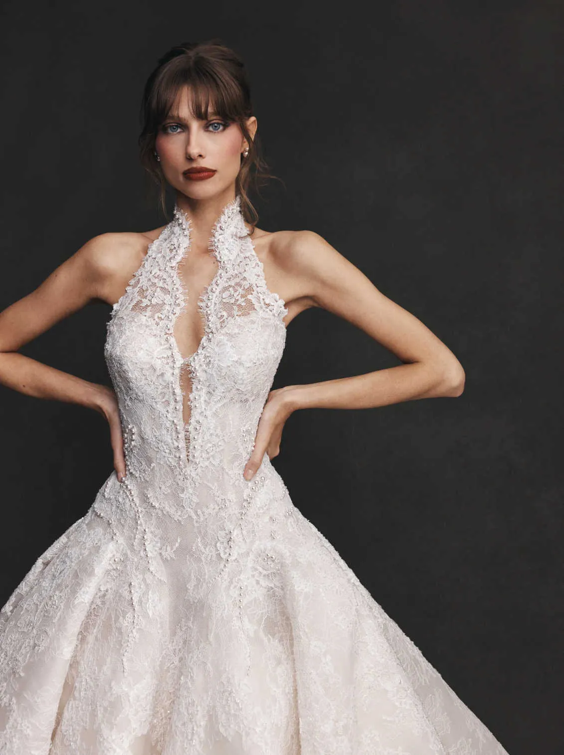 halter v neck wedding dress Plunging Deep Ivory With Pockets US8 / Ivory Goldie is a modern backless wedding dress with a high neck made of luxurious satin Halter V-Neck Wedding Dress Sleeveless