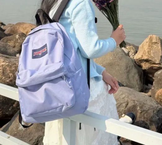 jansport bag latest designs Superbreak Backpack (Red Tape/Land Ahoy) Two large main compartments offer ample storage for your supplies Big Student - Cargo Green