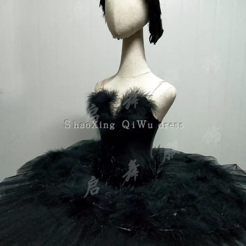 black swan tutu dress Professional Ballet Swan, Richly Decorated With Various Trims, Feathers, and Swarovski Elements. Lake Length from belly button to knees The headband is handmade with black feathers and a sparkly rhinestone Black swan costume, Black bird