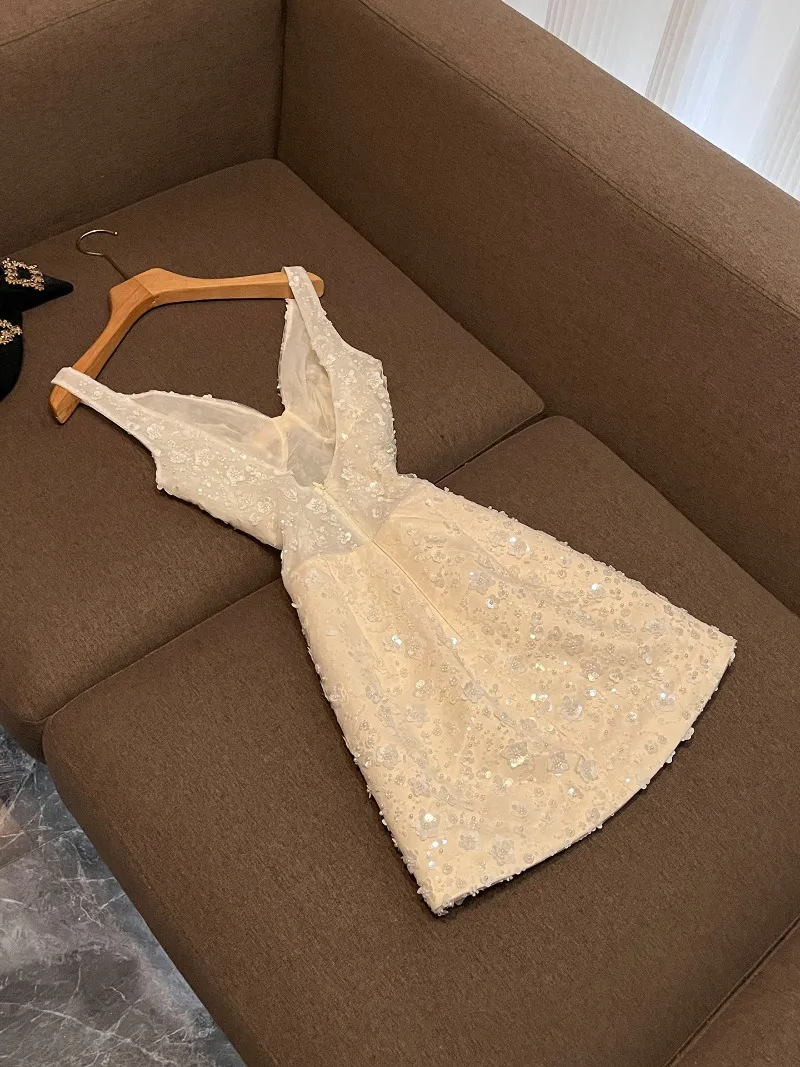 beaded dress summer 2026 Ivory Solid Color Sheer Dress... From Risabeira, Rs.5,238.04 In Bulk the Dolphin Hand Beaded