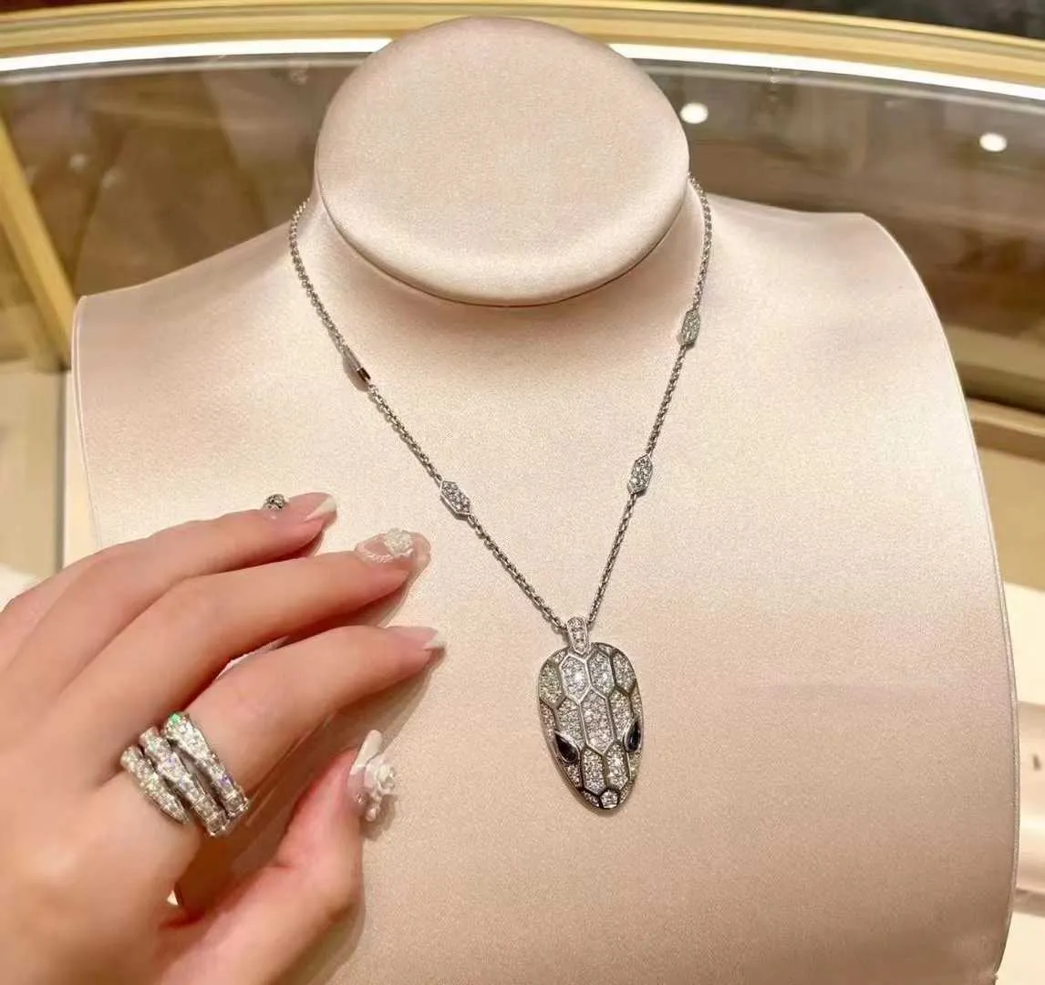 Bulgari snake head necklace sale