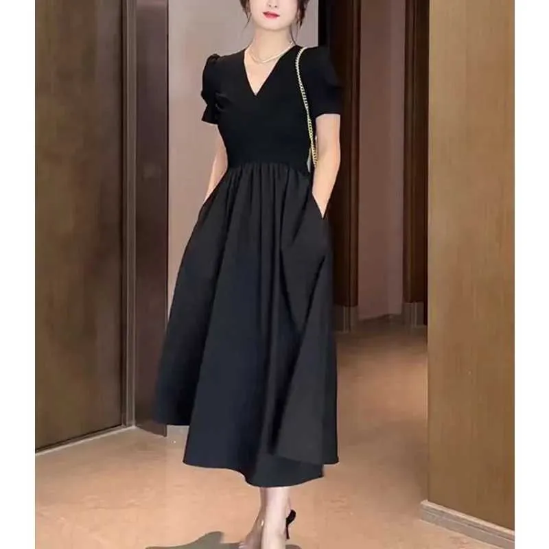 Elegant Minimalist A-Line Black Midi Dress with V-Neck, Spliced Folds, and Slim Pockets for Summer Commuting