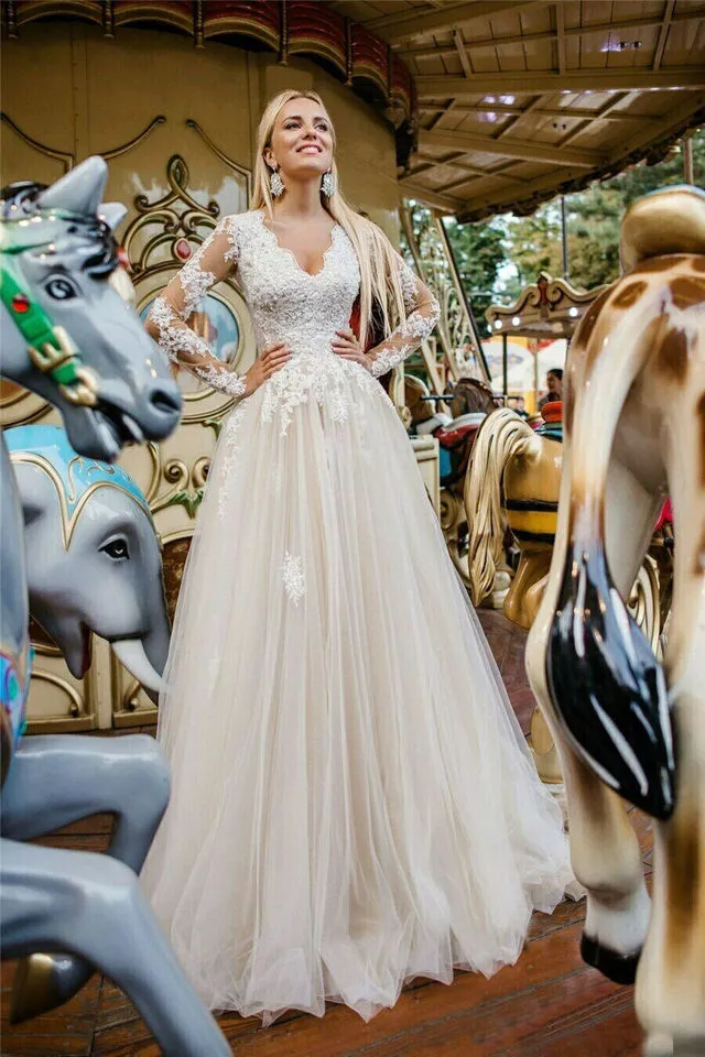 Cream lace long sleeve wedding dress discount