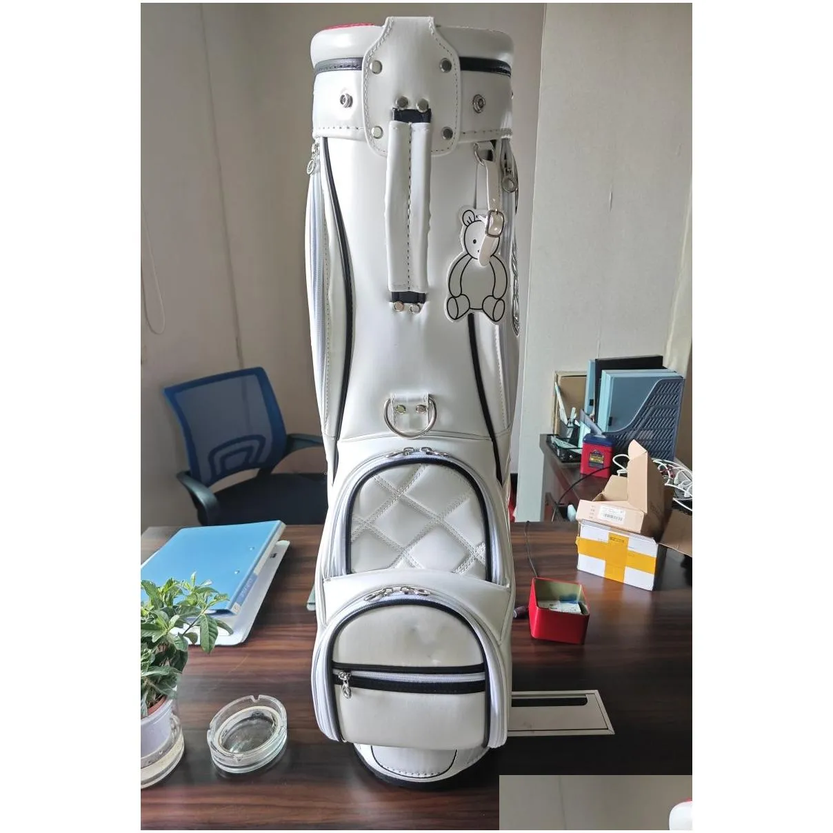 DHgate.com:Waterproof Lightweight PU Leather White Golf