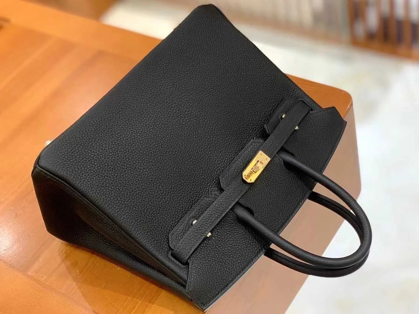 DHgate.com:Designer Litchi Pattern Genuine Leather Handheld